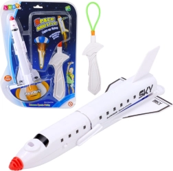 Rumskib med lysende faldskærm og slynge