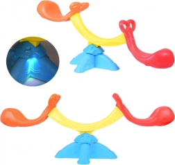 Vippende børnegynge med melodier og lys