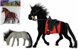 Legetøj hest med sadel og føl