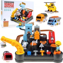 Mekanisk byggespor med små biler og helikopter