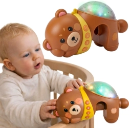 Woopie Baby natteprojektor med bamsemotiv og melodier til tremmesengen
