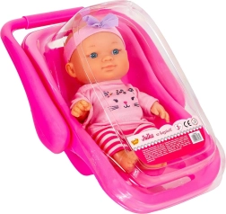 Dukken Julka i lyserød bæresele med lille badekar