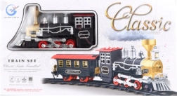 Klassisk togbane med røgudviklende lokomotiv