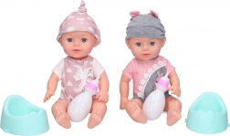 Baby med potte og flaske