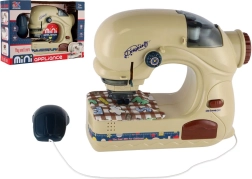 Børnesymaskine med lys på batterier 20 cm