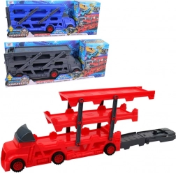 Rød lastbil med transporter og racerbane