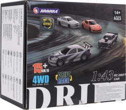 Orange R/C-driftbil i målestoksforhold 1:43 med tilbehør