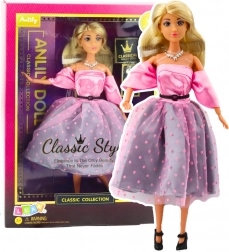 Dukke Anlily i lyserøde prikkede kjoler med bevægelige lemmer