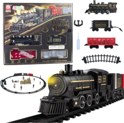 Elektrisk togsæt med damplokomotiv, vogne og spor med lys