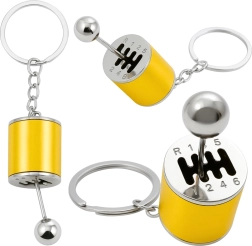 Metalnøglevedhæng formet som gearstang – guld