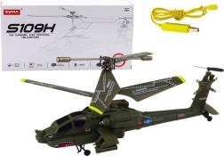 Grøn militær Apache-helikopter med fjernbetjening