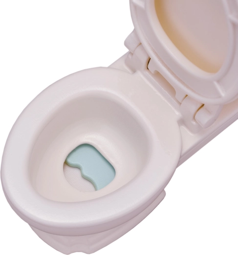 Toilet med løftbart toiletsæde til realistisk leg