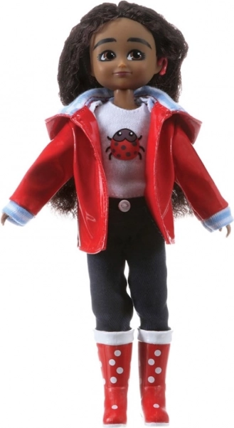 Lottie dukke fotografen Mia med høreapparat