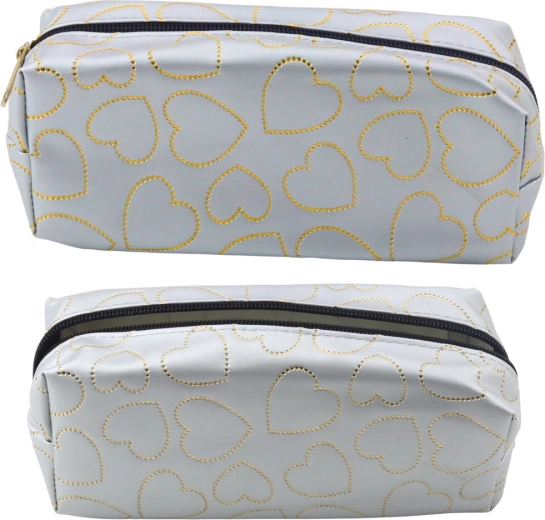 Sølvfarvet skolepenalhus med gyldne hjerter