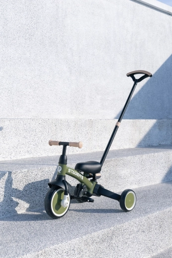 Forældrehåndtag med styrefunktion og højdejustering