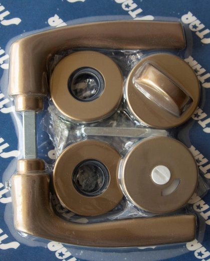 Dørgreb MONET på roset, WC, bronzeret elox