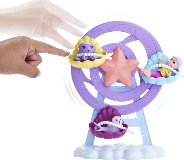 Roterende karrusel med sæder formet som muslinger