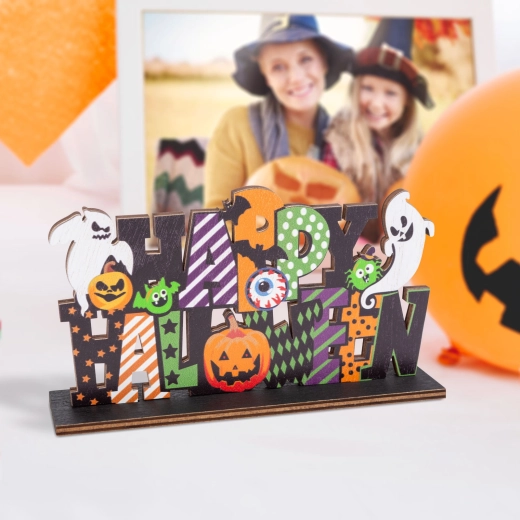 Halloween-trædekoration til hylden med teksten Happy Halloween