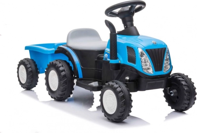 Blå børnetraktor på batteri med trailer
