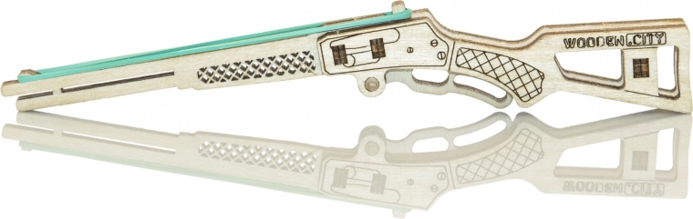Tre træmodeller af pistoler