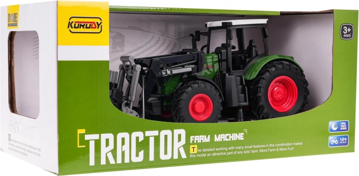 Grøn traktor med grab