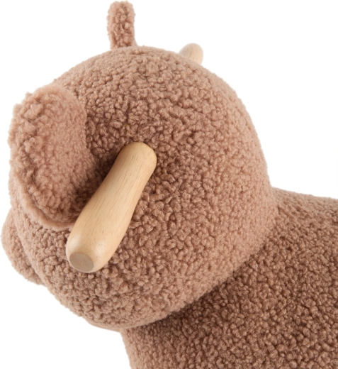 Blød bouclé-overflade, der indbyder til kram