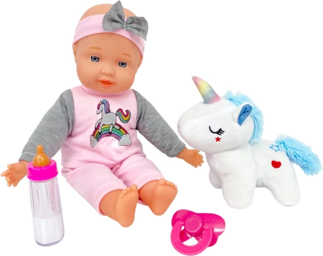 Babydukke med plyselefant 30 cm