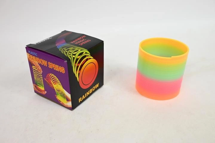 Regnbuefarvet slinky-fjeder i æske