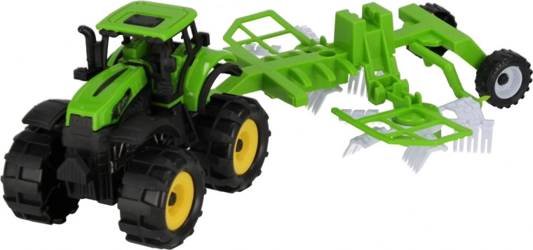 Traktor med påmonteret landbrugsredskab