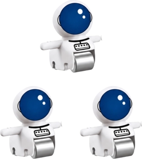 Tre astronautfigurer i pakken