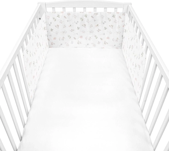 Nænsomt blomstermønster til enhver tremmeseng