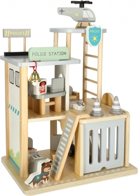 Træpolitistation med garage, bil og helikopter