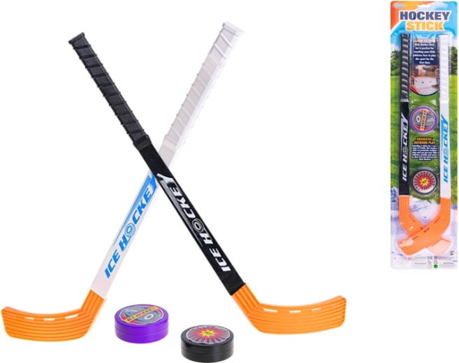 Sæt til børnehockey 57 cm med to pucke