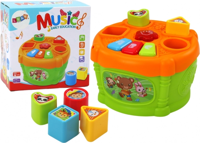 Interaktivt pædagogisk plastlegetøj formet som tromme