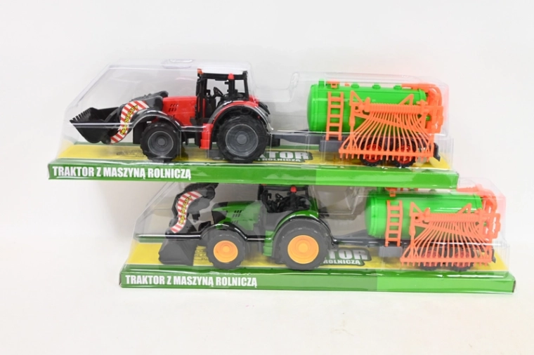 Traktor med frontlæsser og landbrugsredskab