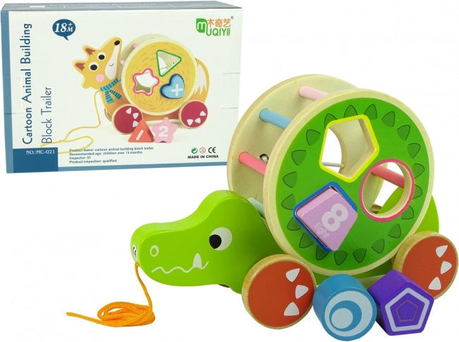 Trækslegetøj i træ – krokodille med sorteringsfunktion