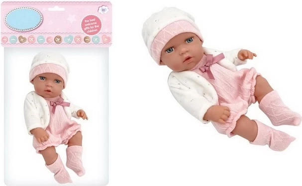 Babydukke i lyserødt og hvidt tøj