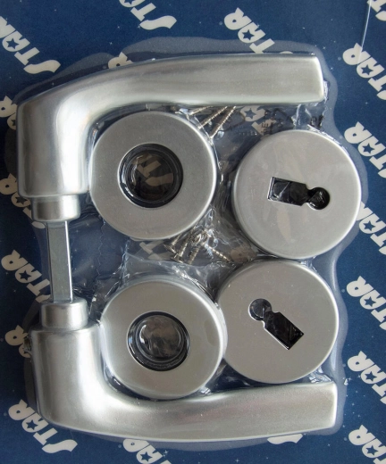 Dørrosetgreb MONET, nøgle, sølveloxeret