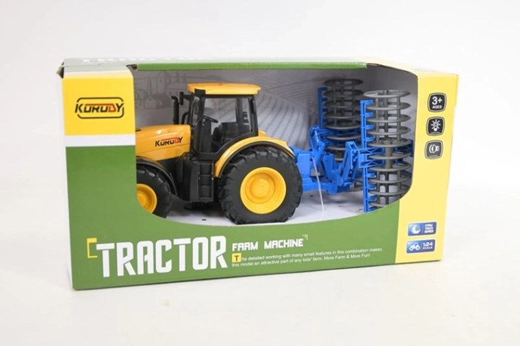 Traktor med tilkoblingsbar plov med lys og lyd