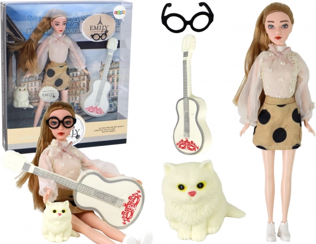 Dukken Emily med guitar, briller og killing