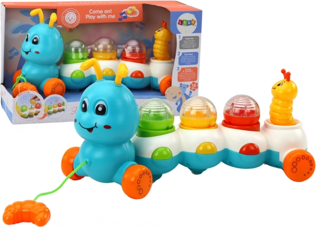 Farverig trækkende larve med lys og lyde