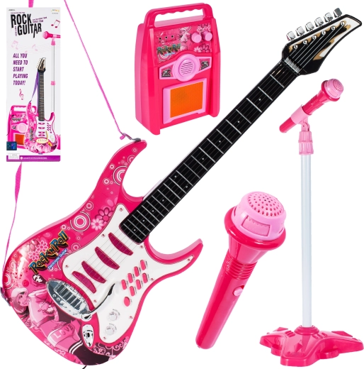 Rosa guitar med forstærker og mikrofon