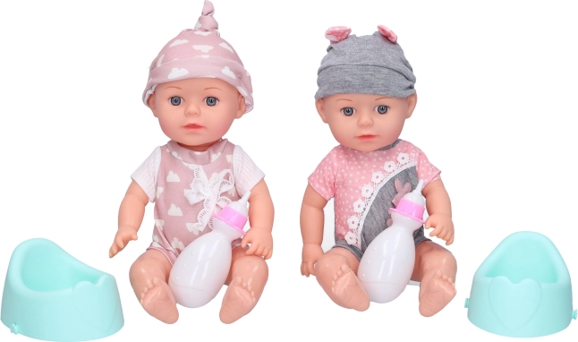 Baby med potte og flaske