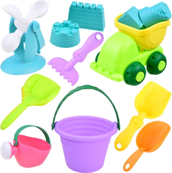 Sæt med sandkasselegetøj med farverig spand og lille bil