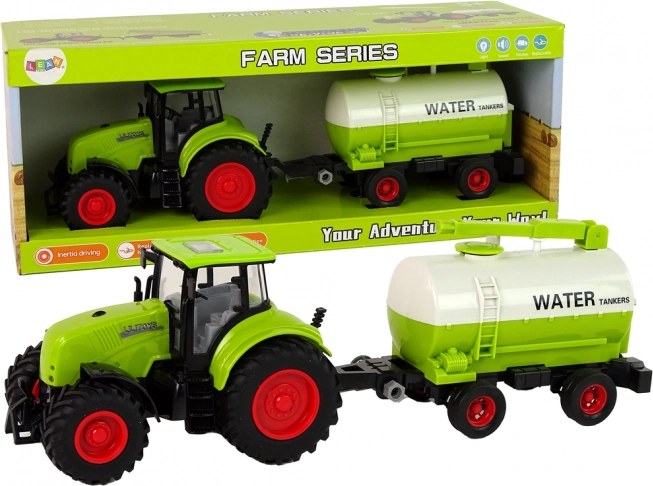 Grøn traktor med trailer på store hjul