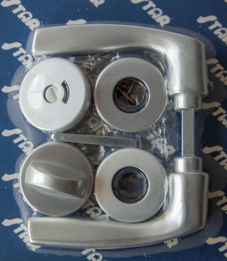 Dørroset-beslag MONET WC, sølvanodiseret