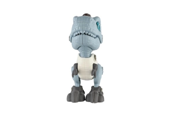 Dinosaurus skruelig plast 12cm med skruetrækker til batterier med lys og lyd i æske 15x16x7cm