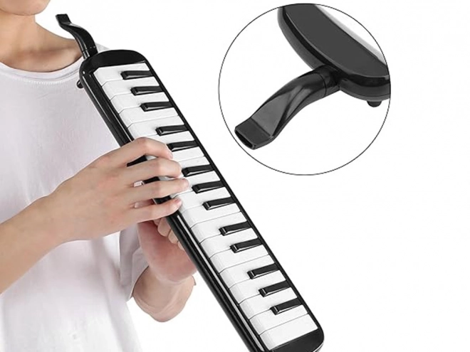 Melodika med klaviatur og etui