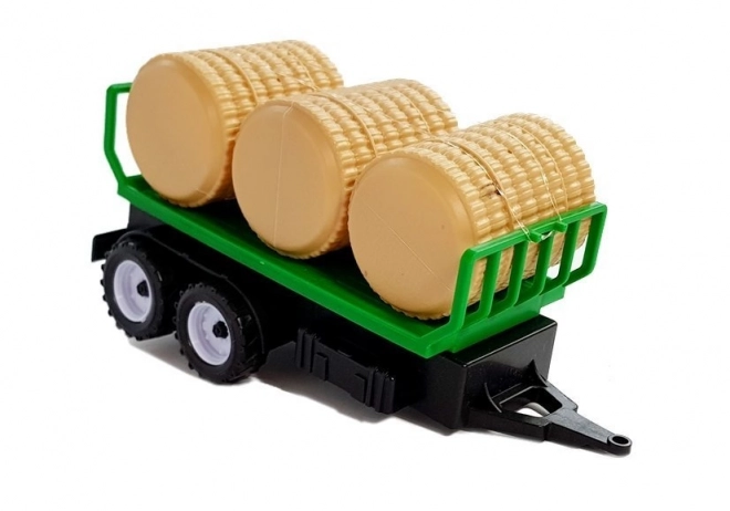 Traktor med trailer til høballer og tankvogn