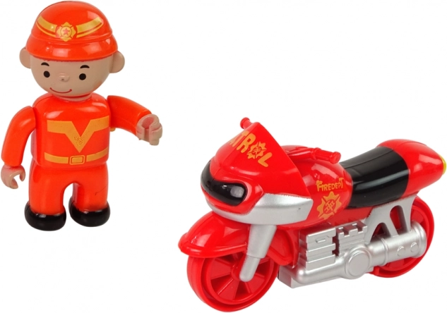 Motorcykel med brandmandsfigur